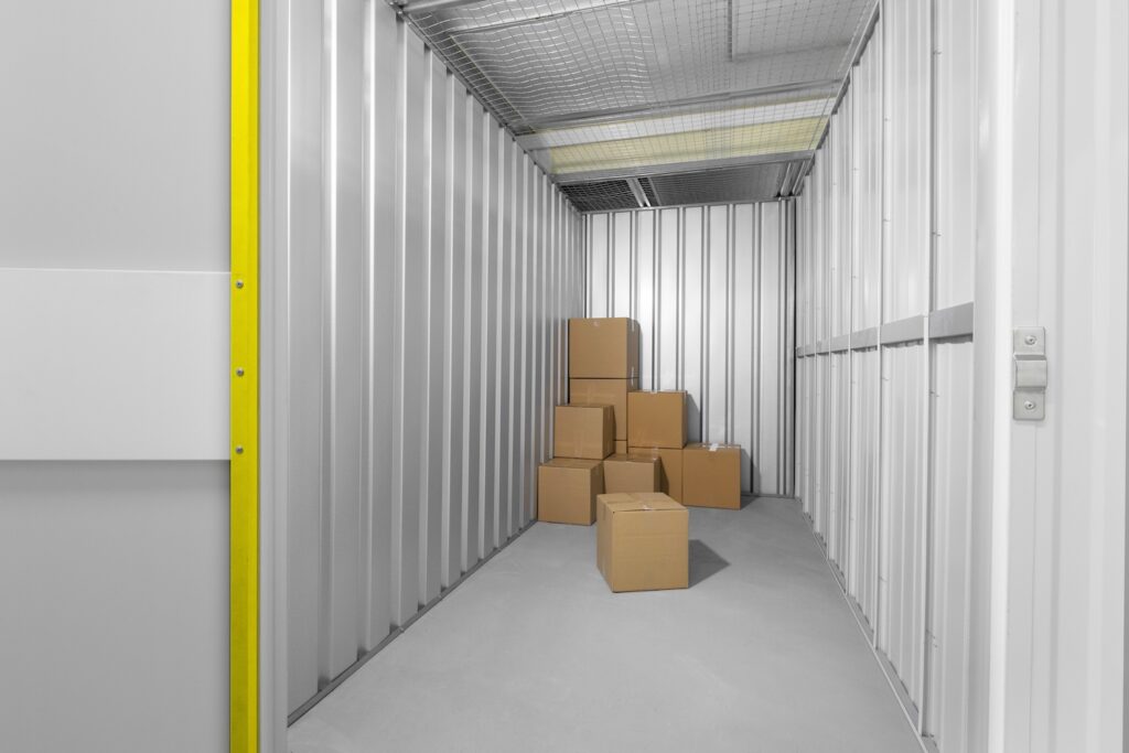 Boxes stacked inside a storage unit.